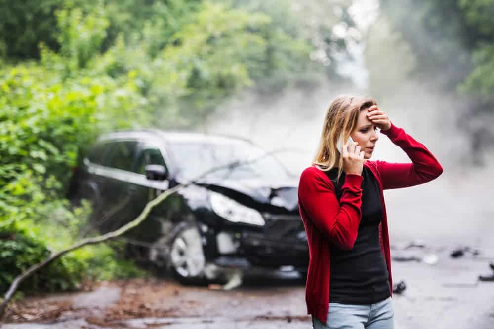 Victim Calling 911 After a Car Accident
